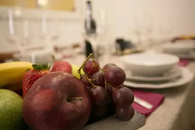 a bunch of fruit on a counter in a kitchen at Thebestinrome Piazza del Popolo - Vico in Rome