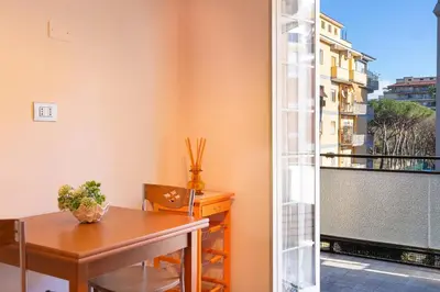 a dining room with a table and a window at Altavilla by Rental in Rome in Rome