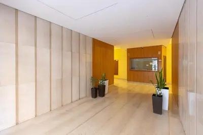 an empty hallway with potted plants in a building at Altavilla by Rental in Rome in Rome