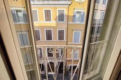 a view of a building from a window at Monti Charming Apt Boschetto in Rome