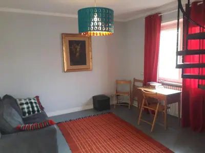 a living room with a couch and a table at Gallia in Rome