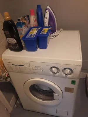 a washing machine with items on top of it at Gallia in Rome