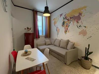a living room with a couch and a table at The Pope's House in Rome