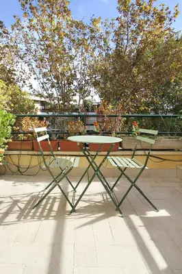 a table and two chairs sitting on a patio at Charming apartment in Trastevere in Rome