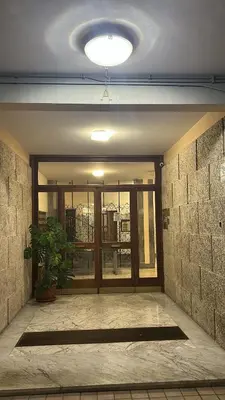 a room with a door with a potted plant in it at Suite 155 in Rome
