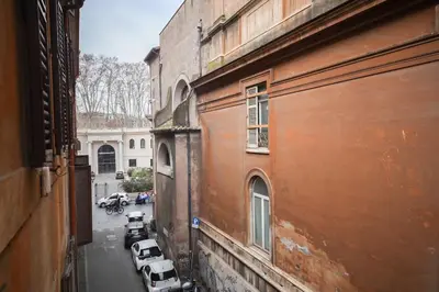 a view of a street with cars parked on the street at 500m from Piazza di Spagna - Canova Home by Hôtea in Rome