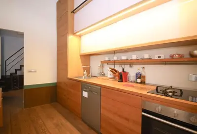 a kitchen with a sink and a counter top at 500m from Piazza di Spagna - Canova Home by Hôtea in Rome