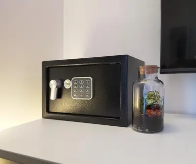 a small microwave sitting on a counter with a glass jar at Prisma Rooms in Rome