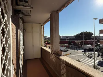 an empty balcony with a view of a parking lot at Apartment in the heart of EUR in Rome