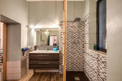 a bathroom with a sink and a mirror at Cappellari Campo dei Fiori int 2 in Rome