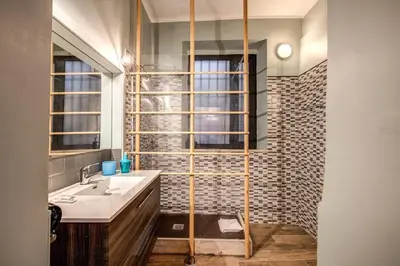 a bathroom with a sink and a shower at Cappellari Campo dei Fiori int 2 in Rome