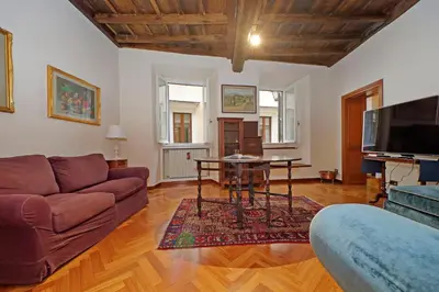a living room with a couch and a table at Leutari in Rome