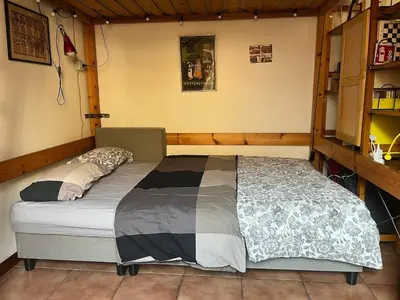 a bedroom with a bed in a room at Cozy studio at pedestrian street in Rome