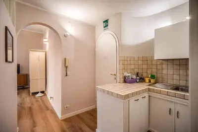 a kitchen with a sink and a counter top at Cappellari Campo dei Fiori int 3 in Rome
