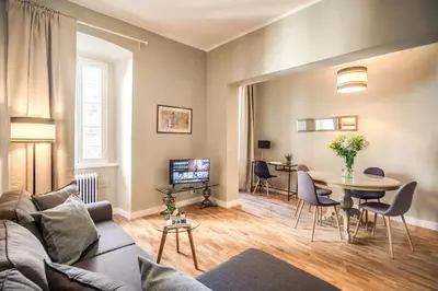 a living room with a couch and a table at Cappellari Campo dei Fiori int 5 in Rome