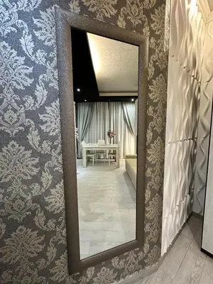 a mirror on a wall in a room at lucky home in Trastevere in Rome