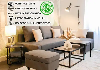 a living room with a couch and a table at 50mt Metro Station - 20min walking from Colosseum - RomeCentralHouse - Elegant and fully equipped in Rome