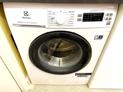 a white washing machine in a room at Monti Lovely Suite in Rome
