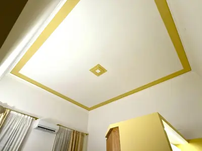 a room with a coffered ceiling with a skylight at Monti Lovely Suite in Rome