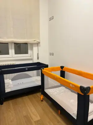 a room with two bunk beds and a window at Floresa Vatican Elite in Rome