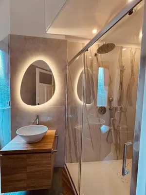 a bathroom with a sink and a shower at Casa Umbertina in Rome