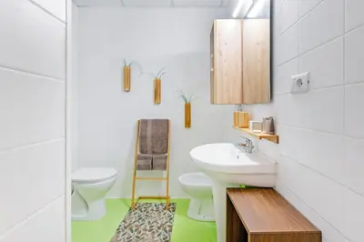 a bathroom with a sink and a toilet at Renè home - Ponte Milvio in Rome