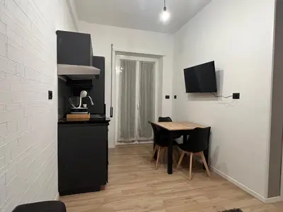 a dining room with a table and chairs at Roiti House Holiday - Roma da Vivere in Rome