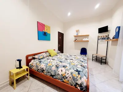 a bedroom with a bed in a room at House 5 minutes walk from Vatican Museums in Rome