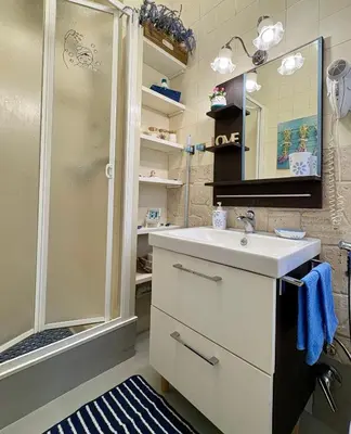a bathroom with a sink and a shower at Roma Stellata in Rome