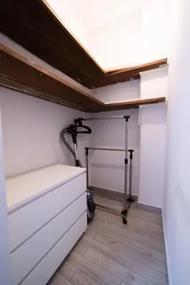 a garage with a treadmill and a room with a ceiling at Loft Aurelia 336 in Rome