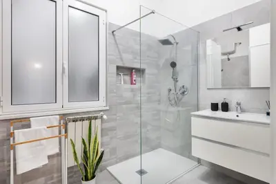 a bathroom with a shower and a sink at Lacasadigió in Rome
