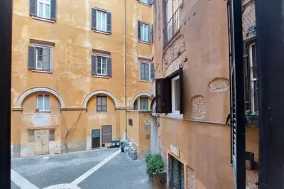 a view of an alley between two buildings at Pantheon Apartment Rondanini in Rome