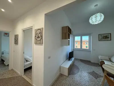 a living room with a couch and a table at Stylish & Trendy Hub in Rome in Rome