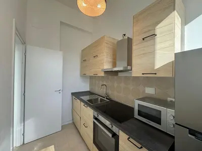 a kitchen with a sink and a microwave at Stylish & Trendy Hub in Rome in Rome