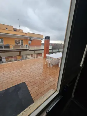 a view from a window of a patio with a table at CS Banchetto Apt 2 pax in Rome