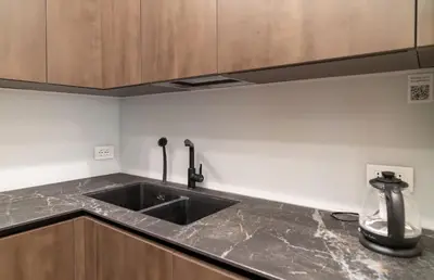 a kitchen with a sink and a counter top at Ampio appartamento A 500 mt dai musei Vaticani in Rome