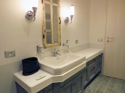 a bathroom with a sink and a mirror at Casa Francesca in Rome