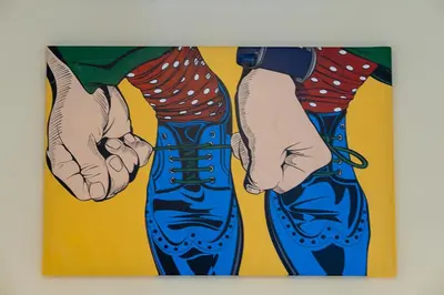 a painting of two hands in blue shoes at Rhome311 - Vatican Apartment in Rome