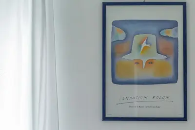 a framed picture of two cats on a wall at iFlat Vatican Comfortable & Peaceful Retreat in Rome