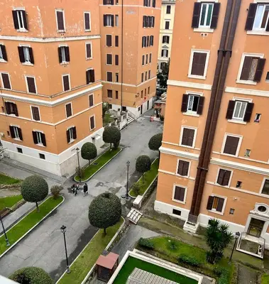 an aerial view of a courtyard between two buildings at Fast Re Apartment in Rome