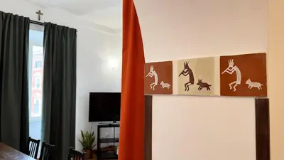 a room with a wall with drawings of animals on it at Domus Leonis in Rome