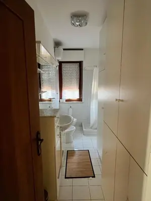a bathroom with a sink and a toilet at The BestaHouse in Rome