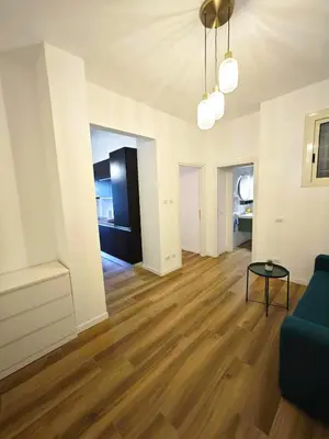 a living room with a couch and a table at DOMUS Villa Chigi in Rome