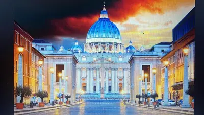 a large building with a dome on top of it at EXCLUSIVE House OTTAVIANO in Rome