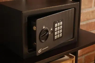 a black microwave oven sitting on top of a table at Wood Apartment - Rome Battistini in Rome