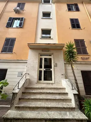 a building with stairs leading up to a door at Daniele Flat - Ospedale Gemelli - Metro Battistini in Rome