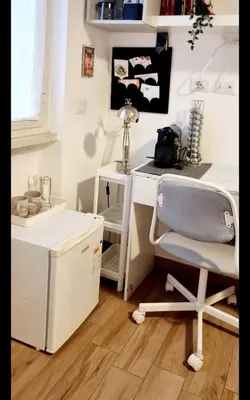 a white desk with a chair in a room at Room Etruria Center Rome in Rome