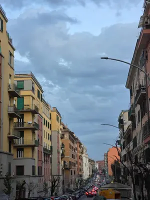 a city street with cars driving down a street at Room Etruria Center Rome in Rome