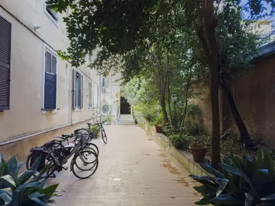 a group of bikes parked next to a building at Saint Peter Beautiful 2BR Apartment in Rome