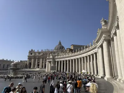 a group of people standing in front of a building at Saint Peter Beautiful 2BR Apartment in Rome